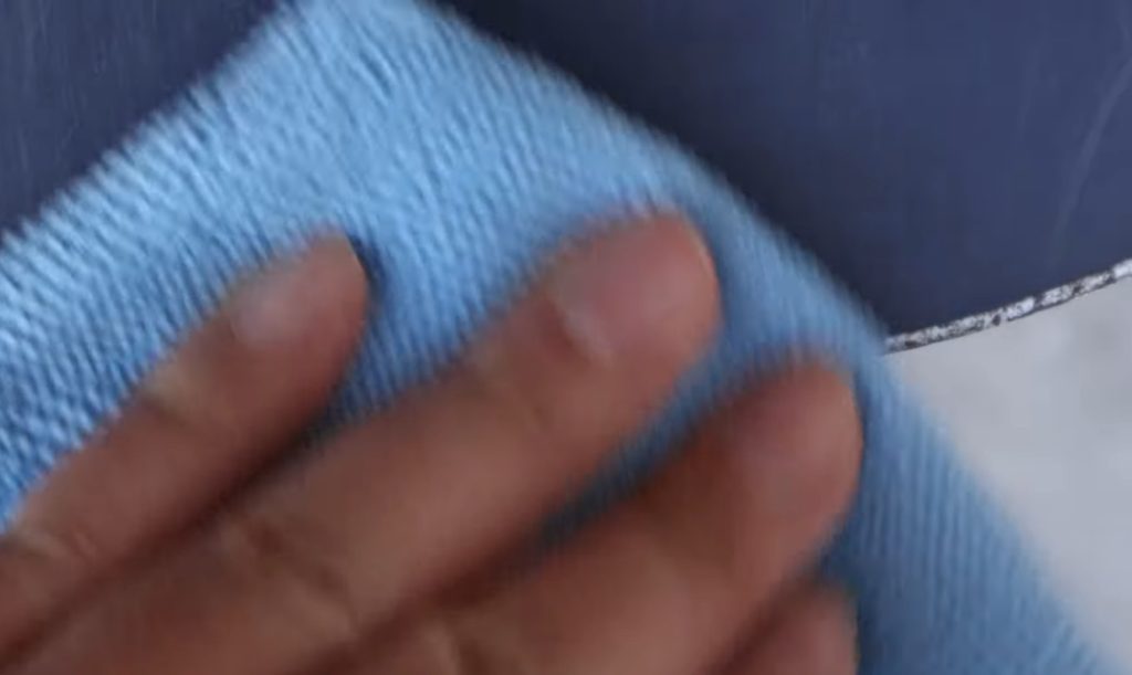 wipe rust away using microfiber cloth